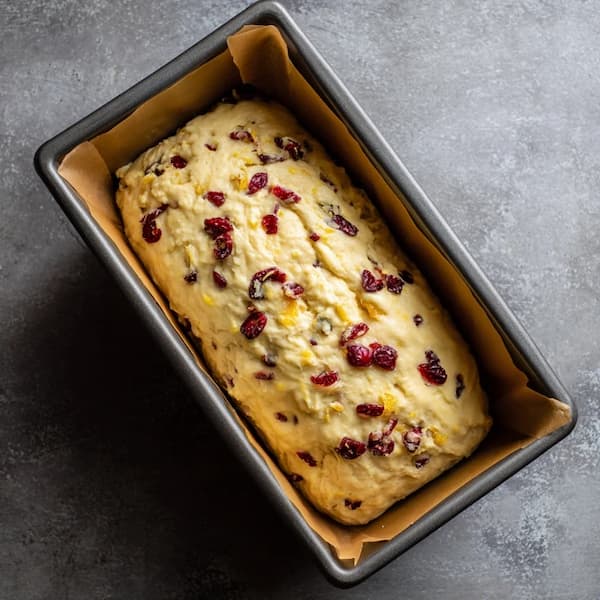 cranberry orange bread in the loaf pan